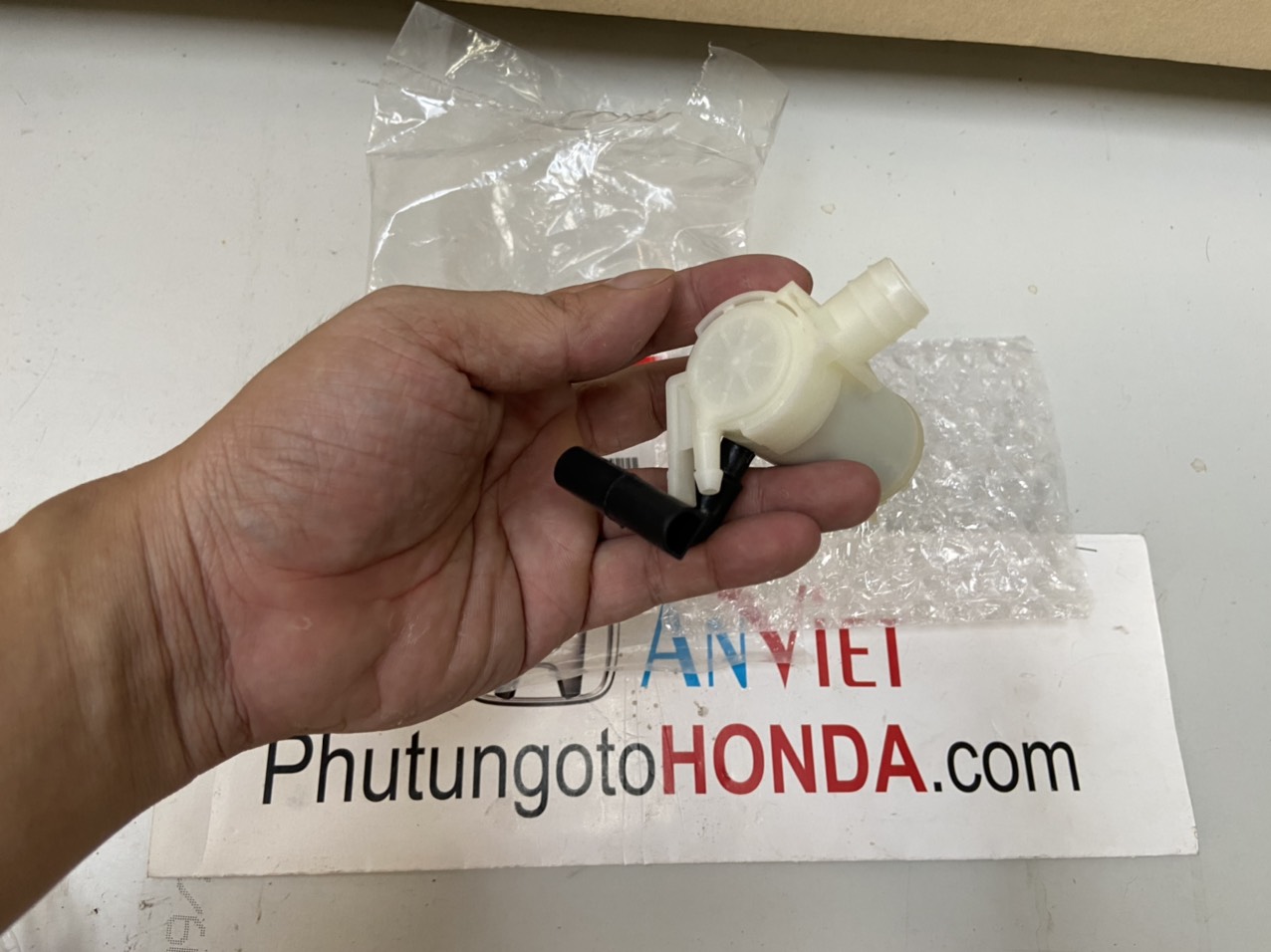 Mô tơ bơm nước rửa kính xe Honda JAZZ